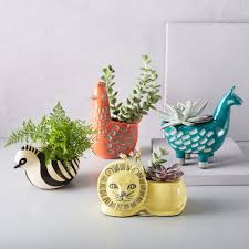 Made from ceramic earthenware, these whimsical planters are a fun way to work some greenery into your space. Ceramic Animal Planters