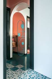 Entrance To A Temple Nook Is Marked By A Custom Art Deco Inspired Screen Miami Art Deco Modern Art Deco Art Deco Style Interior