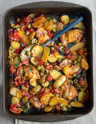 Baked Chicken Thighs With Potatoes Peppers And Olives Recipe Stuffed Peppers Boneless Chicken Thigh Recipes Baked Chicken Thighs