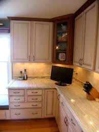 Maple cabinetry is pale enough to provide the light in the mix, allowing you to go darker with countertops and walls. Cherry Maple Cabinets Ambroisa White Granite Tile Backsplash With Glass Accent American Traditional Kitchen Other By Hatchett Design Remodel Houzz