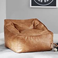 The phoenix is a great spin on the modernthe phoenix is a great spin on the modern swivel accent chair. Vegan Leather Caramel Modern Lounger Pottery Barn Teen