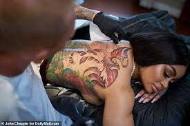 The phoenix rises from the ashes, something blac has made several times. Blac Chyna Reveals Sexy New Tattoo Of A Huge Phoenix On Her Back Daily Mail Online