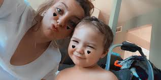 Hi all! I just wanted to introduce myself and share a photo. My name is  Ashley. I'm due in May and will be having a boy!