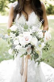 Modern wedding flowers luxe wedding wedding flower arrangements floral wedding wedding ceremony dream wedding wedding bouquets reception wedding. This White Washed Organic Chic Wedding Is What Dreams Are Made Of White Wedding Flowers White Bridal Bouquet White Roses Wedding