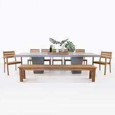 Our beautiful outdoor dining tables pair with a variety of stylish dining chairs for an excellent combination that's just right for your space. Concrete Dining Table With Teak Bench And Chairs Design Warehouse Nz