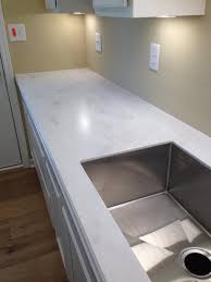 Inexpensive kitchen countertops come in a range of options, including tiled surfaces and laminate. Corian 2 In X 2 In Solid Surface Countertop Sample In Rain Cloud C930 15202rc The Home Depot Corian Countertops Colors Diy Concrete Countertops Corian Kitchen Countertops