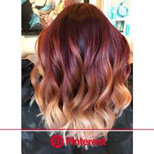 Lighter blonde highlights give an illusion of fullness on a short pixie haircut, while also providing dimension to the reddish base. Melted Embers Burgundy Hair Ombre Hair Blonde Red Hair With Blonde Highlights Clara Beauty My
