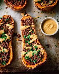 Creamy Lentil Stuffed Butternut Squash Rainbow Plant Life Recipe In 2021 Vegan Dinner Recipes Lentils Butternut Squash