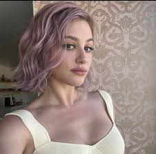 Dove Cameron as Elise Callisto in Zodiac Academy