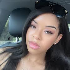 How can I tell who the father of my live-in nanny's baby is in Sims 4?