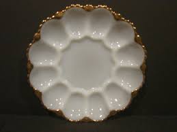 Hold 12 eggs around the edge with room in the center for pickles and olives. Vintage Milk Glass Deviled Egg Plate W Gold And 12 Similar Items