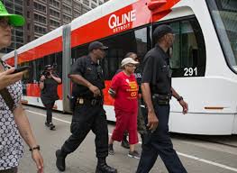 Nearly Two Dozen Arrested For Blocking Qline During Water