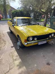 Image result for Herald Yellow 1974 Subaru
