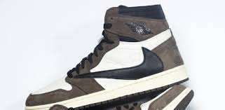 New nike air jordan 1 travis scott lows are boxed in a sturdy brown and red shoe box featuring the nike logo on the lid and side. A Closer Look At Travis Scott S Air Jordan 1