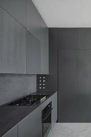 Modern Kitchen With Soapstone Counters Wood Veneer Alloy Series Porcelain Tile European C With Images Minimalist Kitchen Design Minimalist Kitchen Modern Kitchen Design