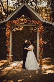 Natalie J Luke S Outdoor Fall Wedding The Rose Reflective Outdoor Fall Wedding Outdoor Fall Wedding Decorations Wedding Arches Outdoors