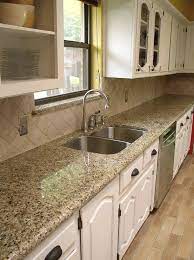 New venetian gold granite is quarried from brazil and is composed of granite and other mineral deposits, giving it a relatively even color tone with some degree of variability in texture and pattern. Pin By Allison Jenks On For The Home Building Kitchen Cabinets Granite Kitchen White Granite Kitchen
