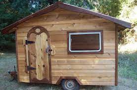 Build Your Own Tiny Cabin On Wheels For 1 500 Tiny House Camper Diy Tiny House Tiny House Trailer
