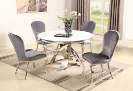 This Modern Set Is Fit For Any Setting With High Standard Good Taste With Matching Polished Stainless Steel Finish For The Chairs And Table Blending With The D