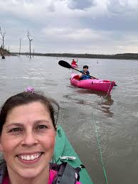 Kayaking with kids in shallow water