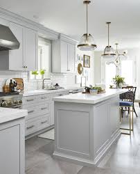 See more ideas about kitchen remodel, kitchen design, kitchen inspirations. Light Grey Kitchen With Celestial Chandelier Over The Kitchen Table White Quartz Countertops White Kitchen Design White Kitchen Remodeling Kitchen Concepts