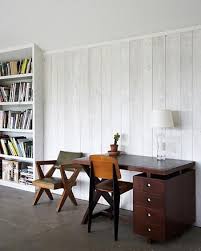 A Stable Reborn In Rural Norfolk Remodelista White Paneling White Washed Wood Paneling White Wash Walls