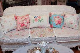 You might think the flowery french style or simple shaker style would be upstaged by oversized seating, but because these pieces are often slipcovered, they manage to. Shabby Chic Sofa Slipcovered With Vintage Chenille Bedspreads And Roses Fabrics Eclectic Living Room Boston By Donna Thomas Vintage Chic Furniture Houzz