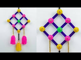 Diy Easy Woolen Wall Hanging Woolen Craft Decoration Ideas With Waste Wool And Ice Cream Stick Woolen Craft Craft Stick Crafts Popsicle Stick Crafts House