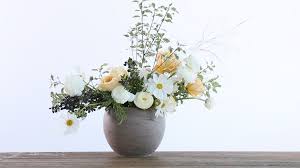 How to arrange flowers in a round vase. How To Arrange Flowers In A Wide Mouthed Vase Sunset Magazine
