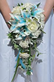 These videos are supposed to be about 5 minutes long, so i was limited as to how much i could show and say. Beautiful Blue Stargazer Lily Veronica Ivory Rose And Freesia Cascade Bridal Bouqu Cascading Bridal Bouquets Stargazer Lily Bouquet Artificial Flower Bouquet