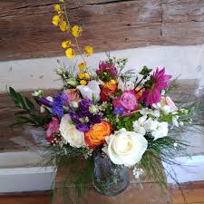 Send beautiful flower arrangements to brighten someone's day! Freesia And Vine