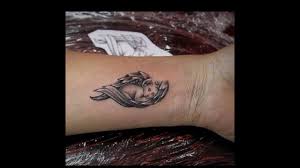 Here are the most popular angel tattoo designs you can get inked with. Angel Wings Tattoo On Wrist Youtube
