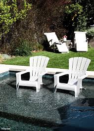 White Plastic Chairs In A Pool Free Image By Rawpixel Com Mckinsey White Plastic Chairs Plastic Chair Chair Photography