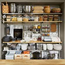 The surface underneath your cabinets can also be used to keep items organized and off of surfaces. How To Organize Kitchen Cabinets Real Homes