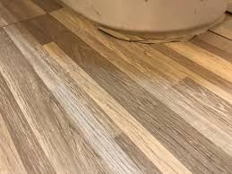You may need extra adhesive to get it to stick well. Trafficmaster Seashore Wood 12 In X 24 In Peel And Stick Vinyl Tile Flooring 20 Sq Ft Case Pw1840 The Home Depot Vinyl Tile Flooring Vinyl Tile Wood Vinyl