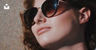 Woman wearing black framed sunglasses photo