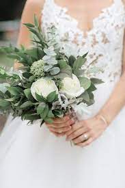 This hand tied silk wedding bouquet has a lot of greenery. 12 Pretty Small Wedding Bouquets For Your Big Day Emmalovesweddings Small Wedding Bouquets Simple Wedding Bouquets Bridesmaid Bouquet White