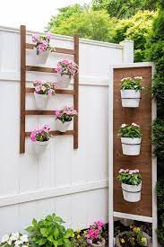 Other creative way to represent the beauty of your small garden, you can attach it on the wall. Get Garden Wall Planters Ideas Pictures Garden Plants