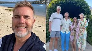 Gary Barlow son's real height as fans go wild over family snap