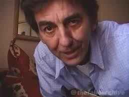 George Harrison's last video. He's playing, "Put A Shine On Your Shoes"