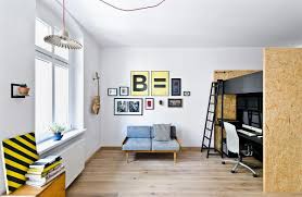 Make a diy room divider for your shared room by positioning a desk or dresser between beds. Kid Friendly Multifunctional Design Studio And Apartment In Poznan
