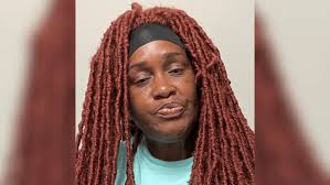 Woman charged with murder, desecration of elderly man