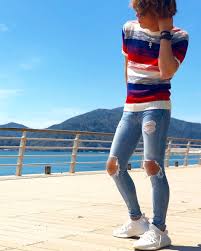 image may contain one or more people people standing sky shoes cloud outdoor and nature スーパースキニージーンズ メンズファッション メンズスキニージーンズ