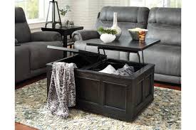 The handy height adjustable tables allow you to switch between a casual dining table and coffee table which means you aren't limited to one type of dining experience. Ashley T 572 Galveston Rising Coffee Table Lenders Furniture
