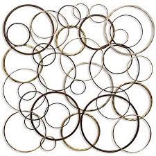 Bring A Modern Accent To Your Walls With This Ring Toss Metal Wall Plaque Its Overlapping Circles And Mixed Brown Wall Art Metal Wall Plaques Wall Sculptures