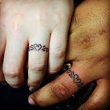 Tattoos For Couples In Love With Distinctive Designs Finger Tattoos For Couples Ring Tattoo Designs Marriage Ring Tattoos