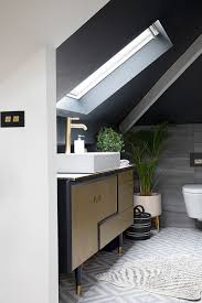 The entire bathroom was designed around the sloped ceiling, which is a striking architectural feature. 13 Attic Bathroom Ideas That Will Convince You It S Time To Move Up Real Homes