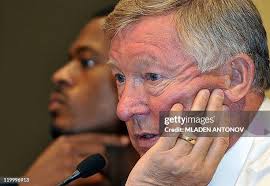 Romona Johnson plays in a fountain at the Inner Harbor with her... News  Photo