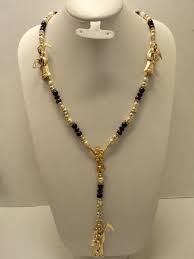 Santa La Muerte Rosario De La Santa Muerte Recargado 2 Oro Laminado 14k 2 600 00 Santa Muerte Muerte Tatuajes De Santa Muerte