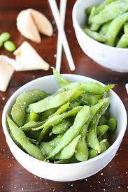 To shell the beans, gently squeeze the pods with your fingers to release them, or have fun putting the pods in your mouth and popping the beans out of their skins. Easy 10 Minute Restaurant Style Edamame How To Eat Edamame